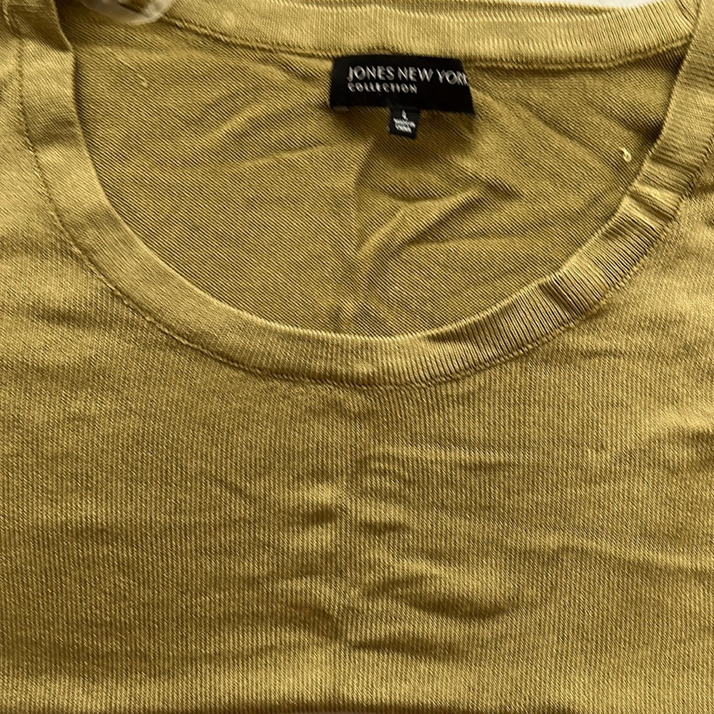 Silky knit shell perfect for the office or casual wear….